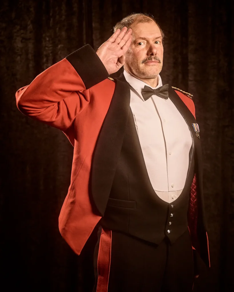 Portrait of actor saluting