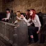 Four actors sat in chair