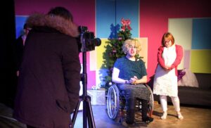 Actor in a wheelchair infront of camera