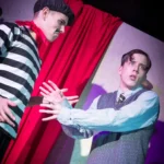 Actor dressed as mime artist with another actor