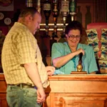 An waiting for a beverage