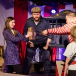Actor punching a book