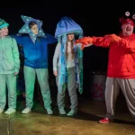 Actors dressed as sea creatures