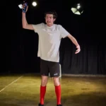 Actor with phone in one hand