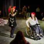 Actor in wheelchair with actress