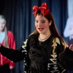 Actress with hands out