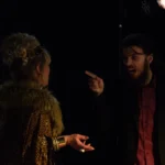 Actor pointing at actress