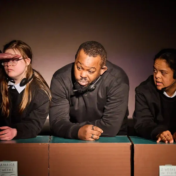 Three actors dressed as security guards.